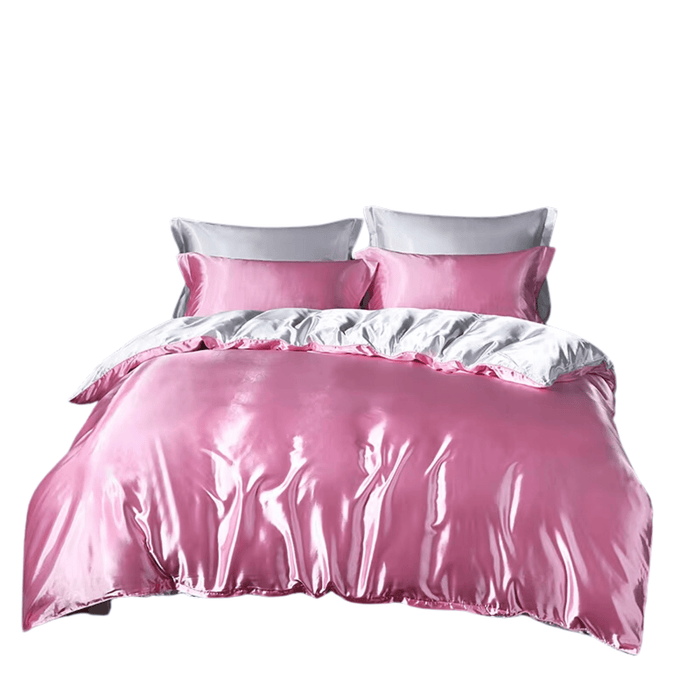 Luxury pink and white satin bedding set with duvet cover, fitted sheet, and pillowcases