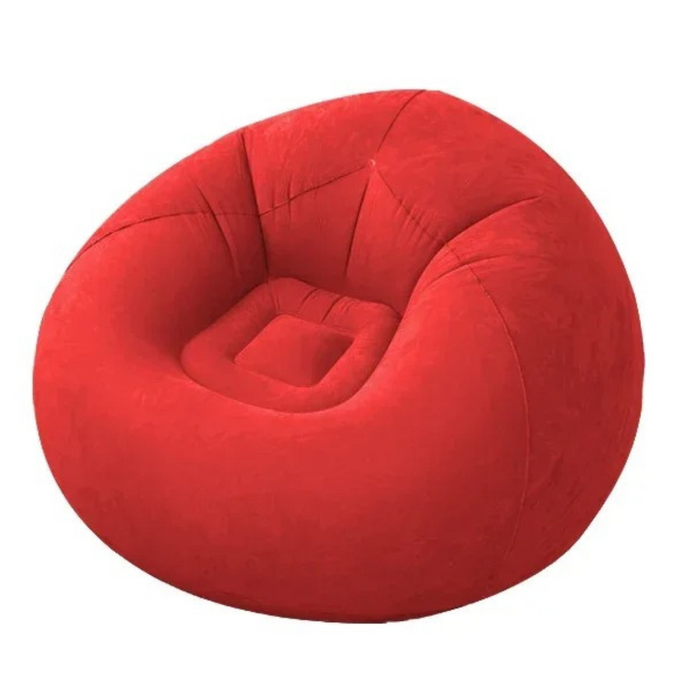 Inflatable red sofa chair in living room setting with ample space for lounging