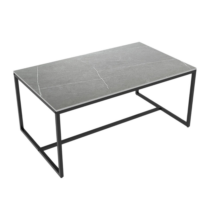 Grey marble and metal frame open rectangle coffee table in a modern living room setting