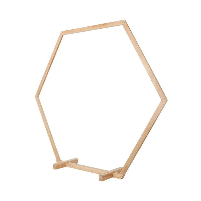 Hexagonal wooden wedding ceremony arch with flower garland and natural wood finish