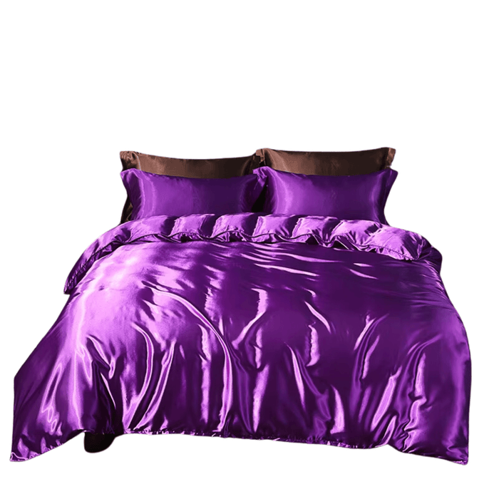 Satin purple bedding set with duvet cover, fitted sheet, and pillowcases