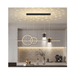 Modern Minimalist Nordic Luxury Chandelier with Black Metal Finish and Plated Hardware