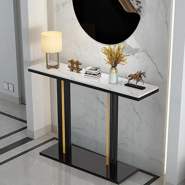 White marble console table with gold accents for narrow living room space