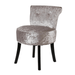 Round velvet upholstered vanity stool chair in silver-grey color with button tufting and rivet detailing