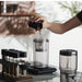 Transparent cold brew coffee maker with adjustable water flow dripper