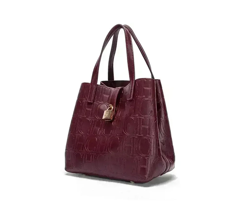 Large capacity to fit daily essentials such as wallet, phone, cosmetics, and more