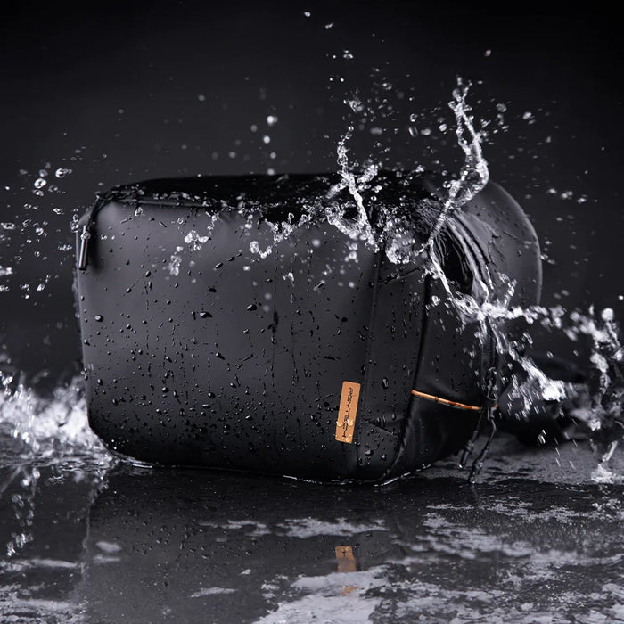 Versatile camera shoulder sling bag fits iPads, MacBooks, and drone gear