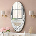 Modern oval wall mirror with bling effect and silver Venetian accent
