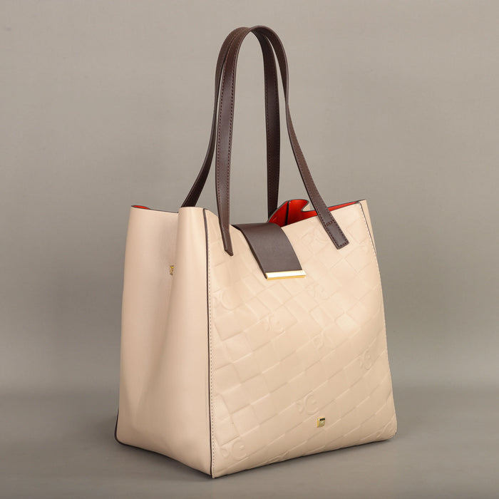 Elegant geometric patterned handbag with a stylish cover closure