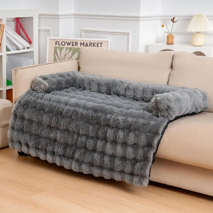 Grey plush dog bed suitable for pets of all sizes and daily use in any room