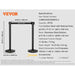 Two black crowd control stanchions with retractable belts for exhibition