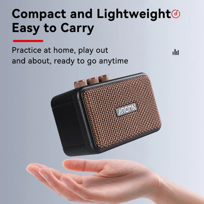Portable electric guitar amplifier with AUX input and headphone output
