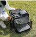 Vibrant orange pet carrier, compact and spacious with sleek, stylish design