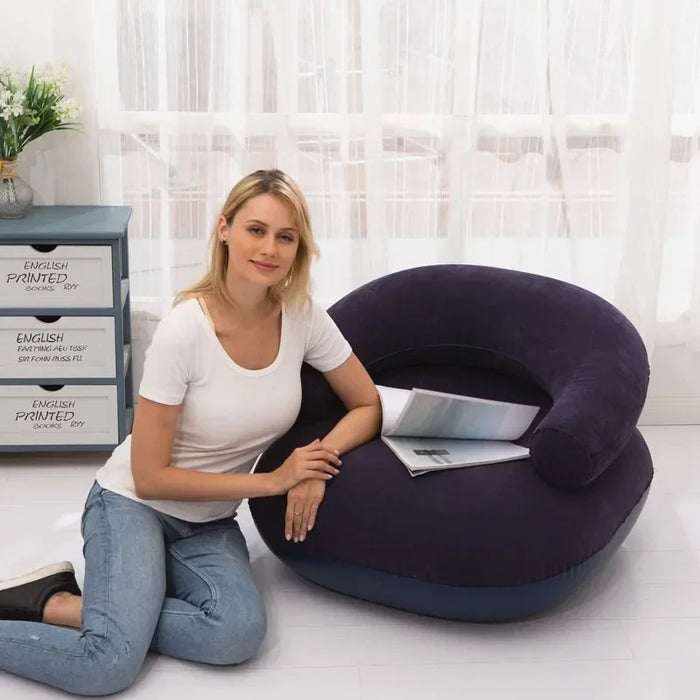 Inflatable armchair in vibrant red for portable outdoor seating comfort