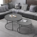 Stackable coffee tables with sleek black-painted metal frames