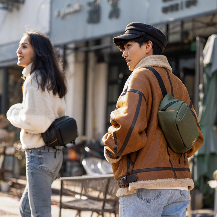 Camera bag with customizable compartments for organizing gear