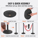 Two durable black stanchion posts with velvet ropes for crowd control