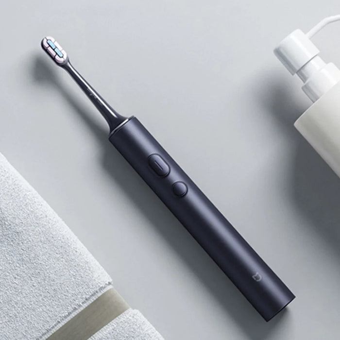 Smart rechargeable electric toothbrush with ultrasonic vibrations for effective teeth cleaning