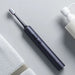 Smart rechargeable electric toothbrush with ultrasonic vibrations for effective teeth cleaning