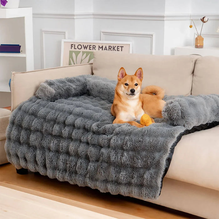 Multi-purpose grey plush dog bed functions as standalone bed or sofa protector