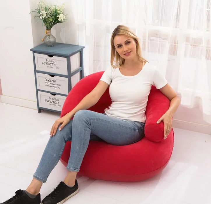 Inflatable armchair in vibrant red color, perfect for camping and outdoor activities
