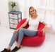 Inflatable armchair in vibrant red color, perfect for camping and outdoor activities
