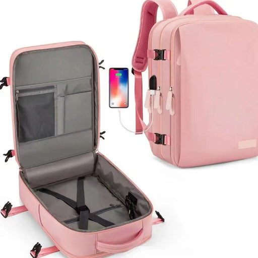Expandable pink travel backpack with USB port and multiple compartments