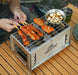 Wood burning stove with removable pot for outdoor cooking