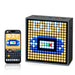 Portable Bluetooth speaker featuring programmable LED display for pixel art creation, clock, and alarm functions