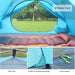 Two-person green winter camping tent with snow skirt and 4-season backpacking shelter designed for outdoor use in cold climates