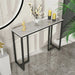 Minimalist console table with dark marble top and sleek black metal legs