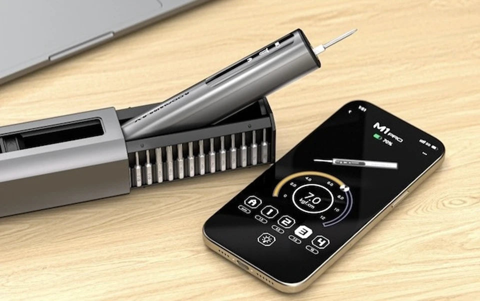 Bits are magnetically attached to the screwdriver head