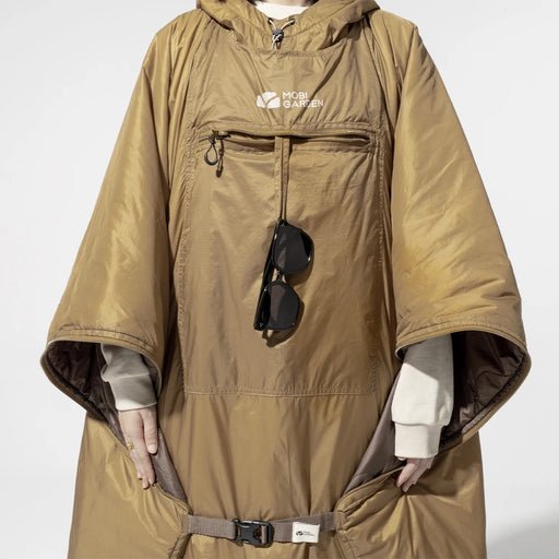 Camping cape sleeping bag in green for outdoor use in cold weather