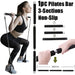 Package contents include resistance bands, workout bar, handles, ankle straps, door anchor, and carry bag
