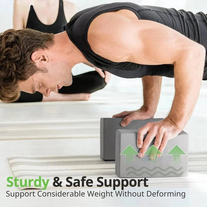 Two lightweight and supportive foam yoga blocks for stability and comfort
