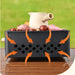 Multi-functional stove with mesh elevator, baking net, and cutting basin