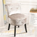 Soft and plush pink crushed velvet vanity stool with comfortable backrest