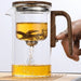 High-quality gray glass teapot with 520ml capacity, solid wood handle, and magnetic one-click separation