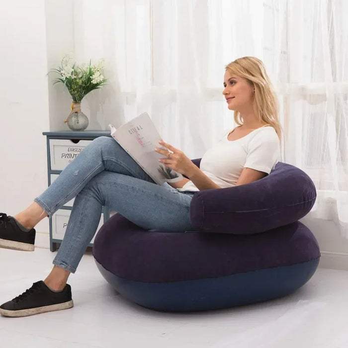 Inflatable armchair in vibrant red, perfect for outdoor activities and camping