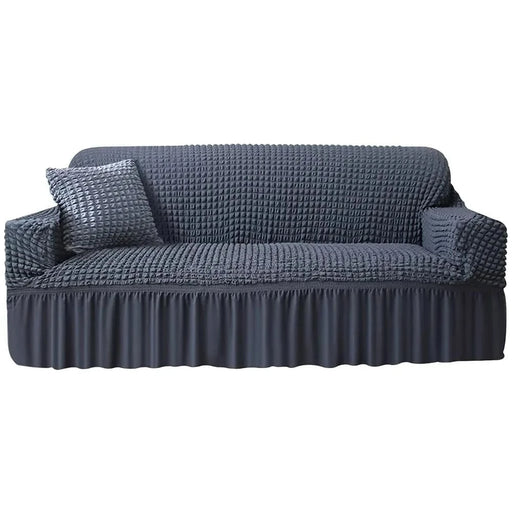 Upgrade your living space with this Plaid Seersucker Stretch Sofa Cover, designed to provide both style and protection for your furniture