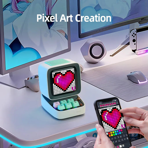 Green Bluetooth desktop speaker with pixel art display and alarm clock