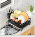 Black expandable dish drying rack with drainboard and utensil holder