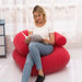 Red inflatable armchair for camping and outdoor use, portable U-shaped seat