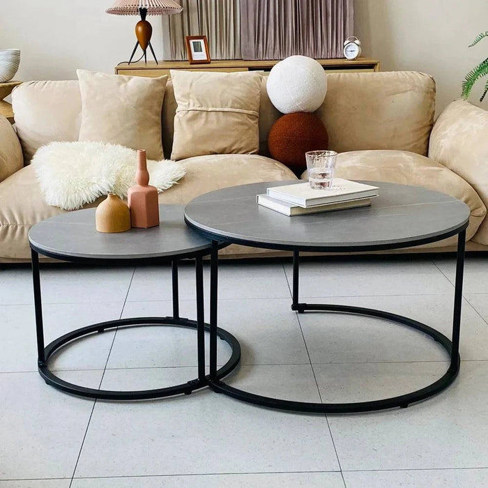 Minimalist round coffee tables with scratch-resistant sintered stone tops
