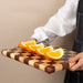 Knife-friendly surface for protecting blades and reducing wear