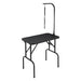 
A blue pet grooming table with adjustable grooming arms and non-slip surface